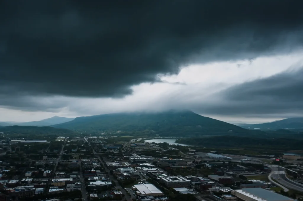 Cloudy sky over a city showing poor weather conditions for stargazing