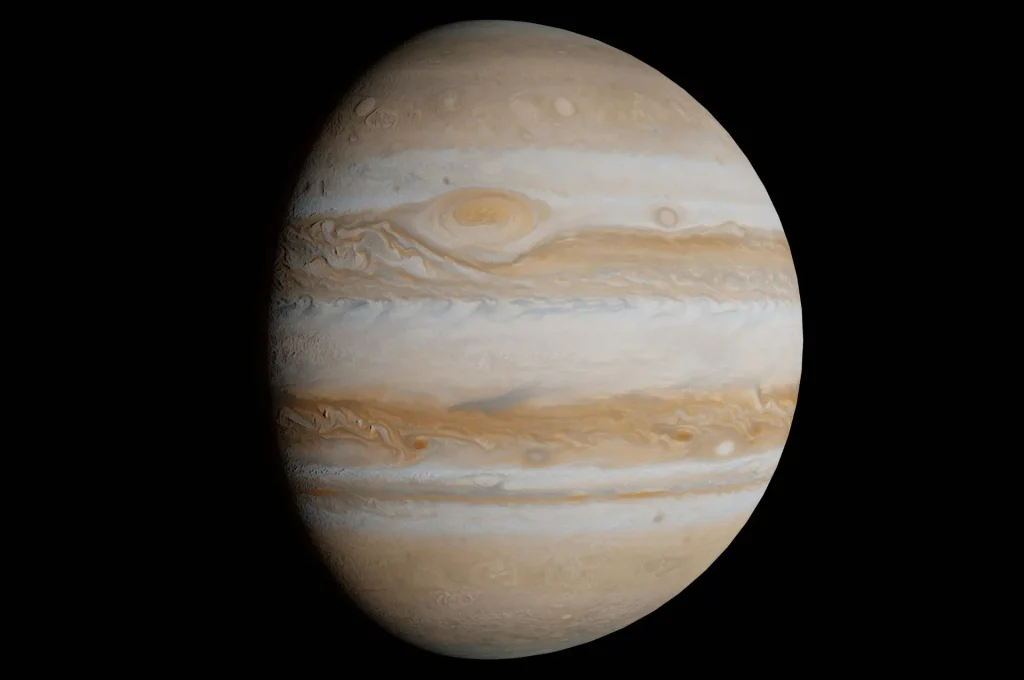 Jupiter showing its cloud bands and Great Red Spot against the blackness of space